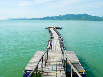 High angle view of pier over sea against sky