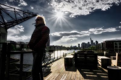 Woman looking at cityscape