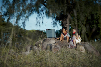 People sitting on field