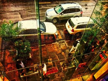 High angle view of cars on reflection