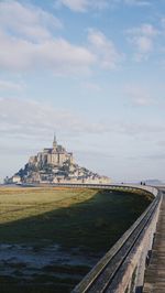 View of temple against sky in city
