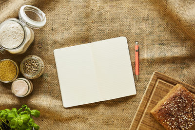 High angle view of open book on table