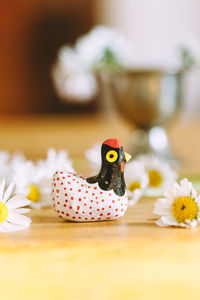 Close-up of figurine on table