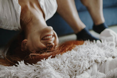 Close-up of woman face on rug