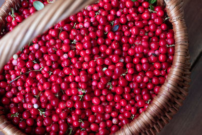 Close-up of handpicked cowberries in a basket