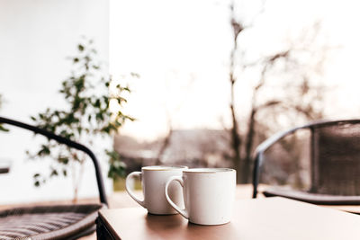 Close-up of coffee cup on table