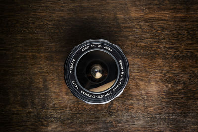 High angle view of camera on table