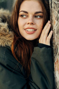 Close-up of woman looking away outdoors