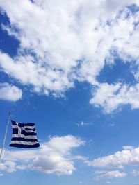 Low angle view of flag against sky