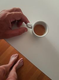 High angle view of coffee cup on table