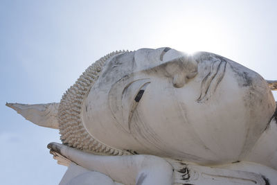 Low angle view of statue against sky