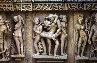 Sculptures on wall at temple
