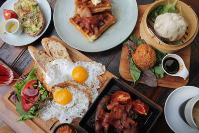 High angle view of various food served on table