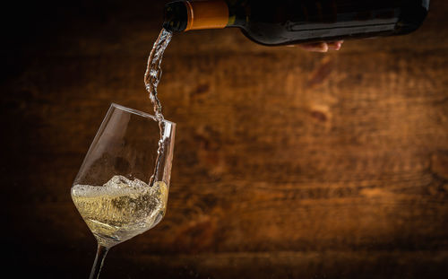 Close-up of wineglass on table