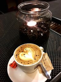 High angle view of coffee cup on table