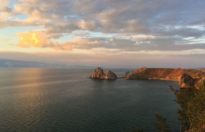 High angle view of sea by mountain