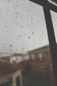 Close-up of water drops on glass