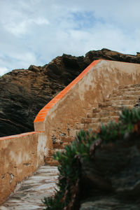 Low angle view of stone wall of building