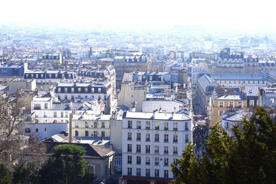 High angle shot of townscape against sky