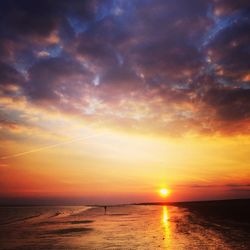 Scenic view of sea at sunset
