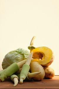 Close-up of bananas against white background