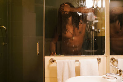 Portrait of woman in bathroom at home