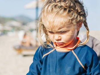 Close-up of girl looking down