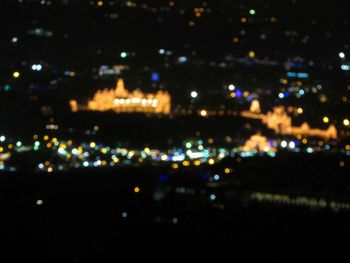 High angle view of illuminated city at night