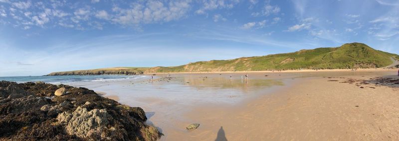 Scenic view of beach against sky