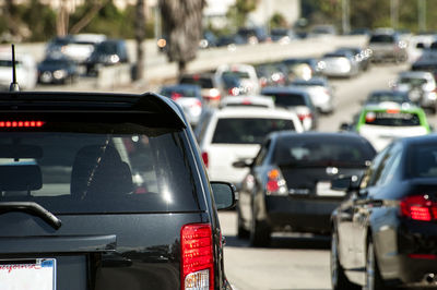 Close-up of traffic on road in city