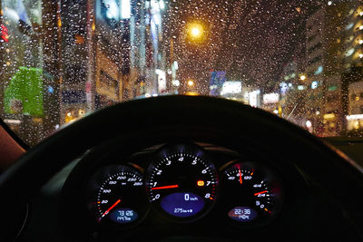 Close-up of speedometer in car