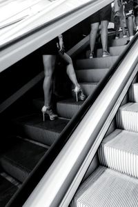 High angle view of woman on escalator