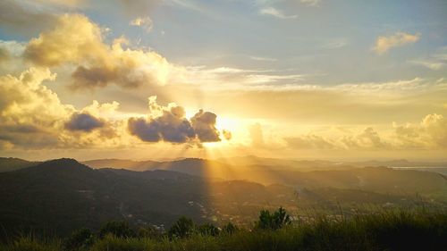 Scenic view of landscape against sky during sunset