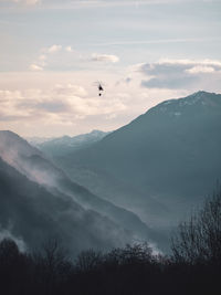 Scenic view of silhouette mountains against sky