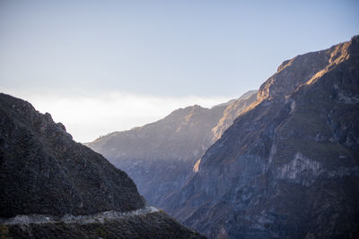 Scenic view of mountains against clear sky