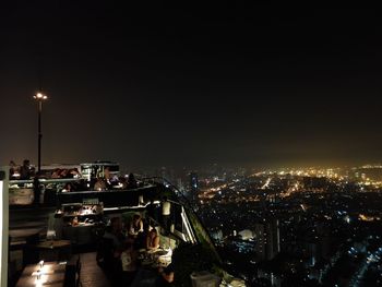 Illuminated cityscape at night