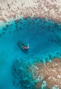 High angle view of sailboat in sea