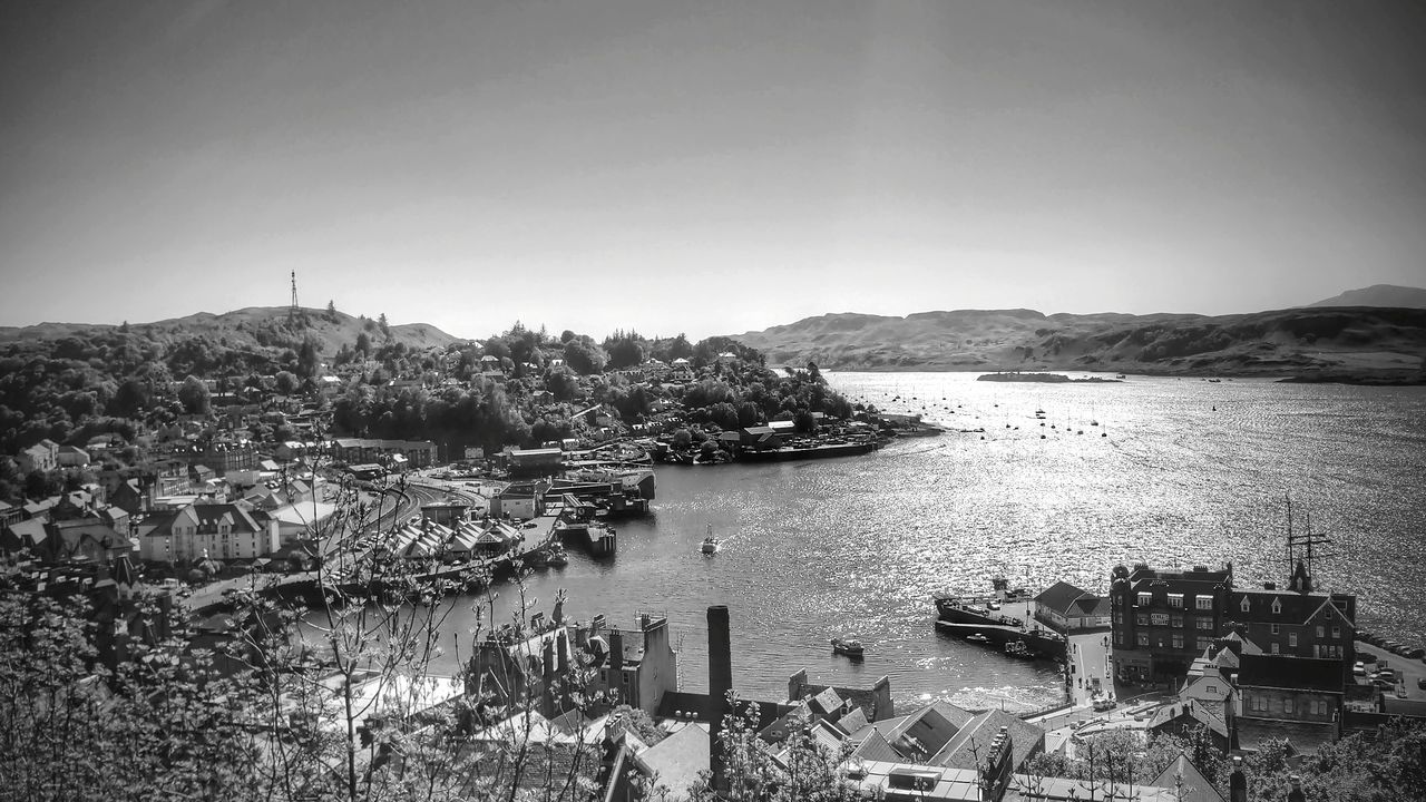 PANORAMIC VIEW OF HARBOR AGAINST SKY