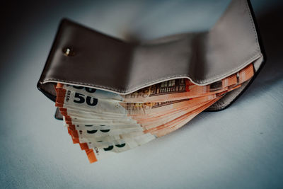 Close-up of paper currencies on table