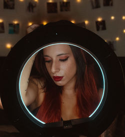 Portrait of young woman looking away