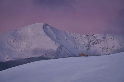 Snow covered mountain against sky