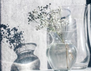 Close-up of glass vase on table