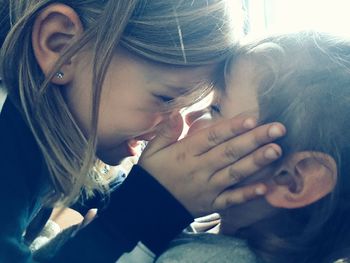 Close-up of playful cute siblings