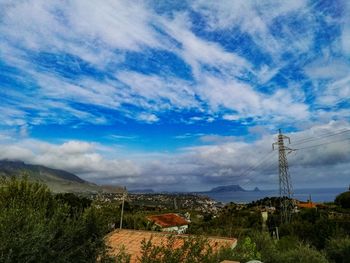 Scenic view of landscape against blue sky