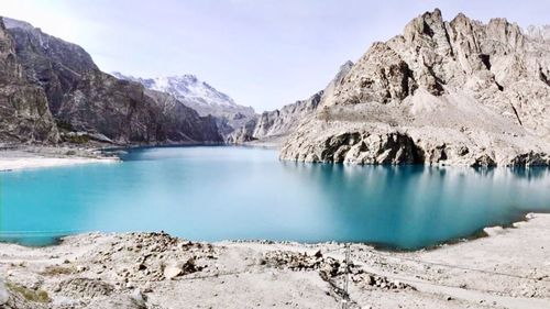 Panoramic view of lake and mountains against sky