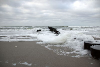 Scenic view of beach against sky