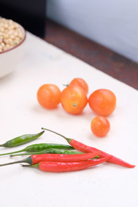 High angle view of tomatoes in plate on table