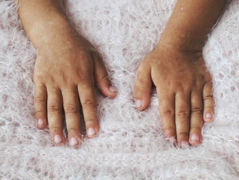 High angle view of hands