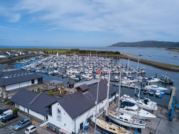 High angle view of harbor by buildings in city