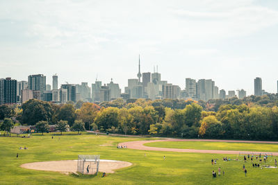 Buildings in city against sky